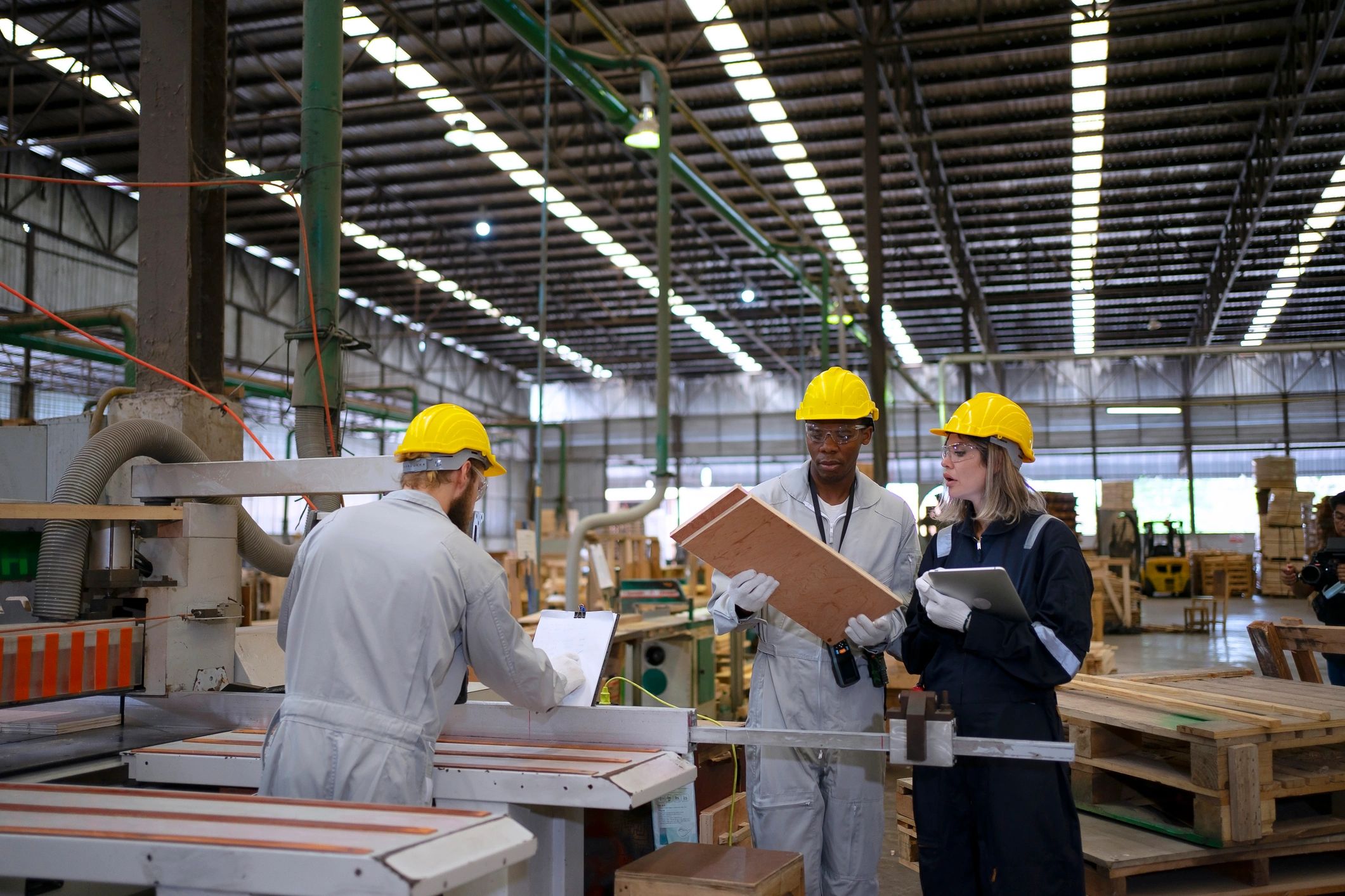 Industrial workers in a manufacturing environment